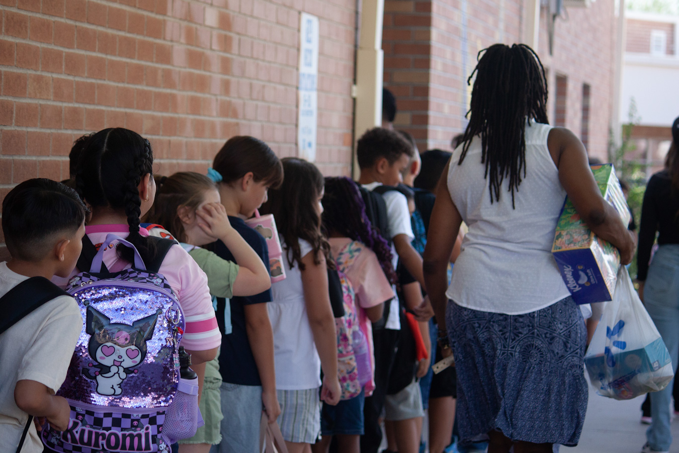 Students line up outside on the first day